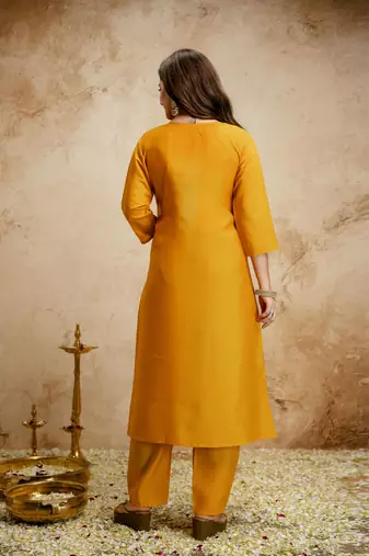 Yellow color chanderi partywear readymade salwar kameez for graceful looks