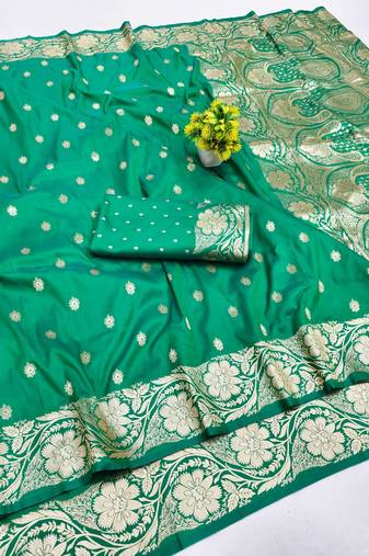 Green zari woven silk blend saree with blouse piece