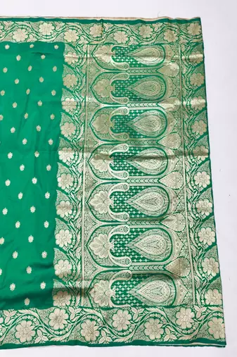 Green zari woven silk blend saree with blouse piece