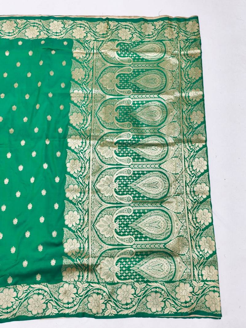 Green zari woven banarasi silk blend saree with blouse piece
