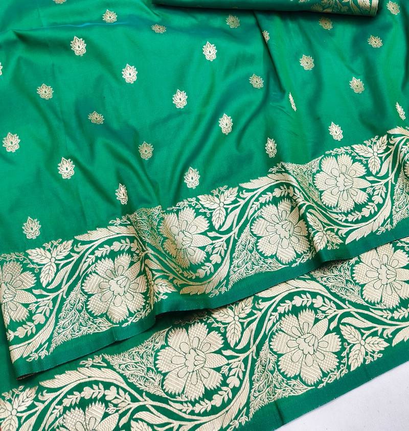 Green zari woven banarasi silk blend saree with blouse piece