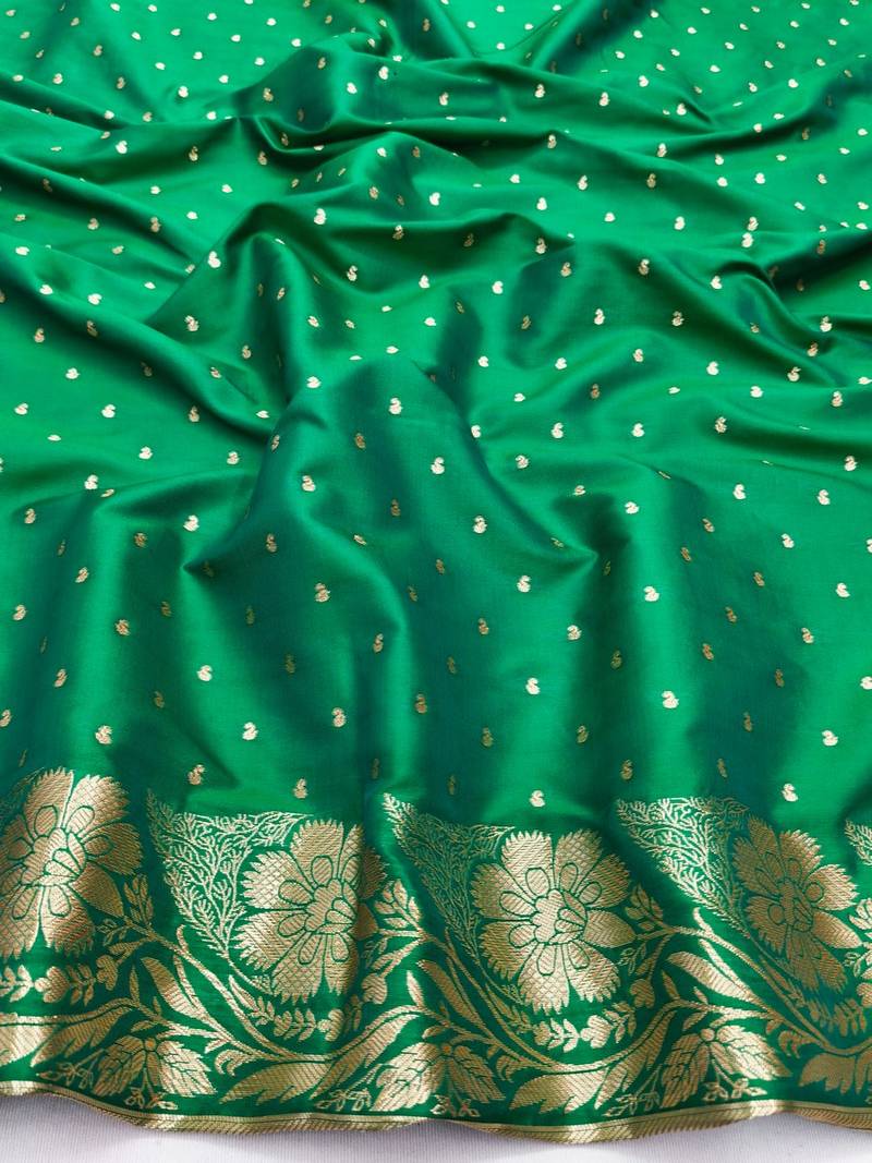 Green zari woven banarasi silk blend saree with blouse piece