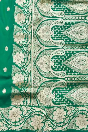 Green zari woven silk blend saree with blouse piece