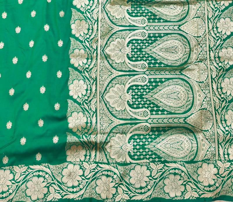 Green zari woven banarasi silk blend saree with blouse piece