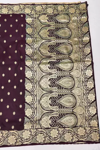 Wine zari woven silk blend saree with blouse piece