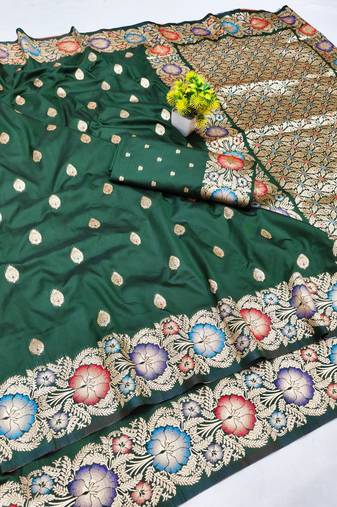 Dark green zari woven banarasi silk blend saree with blouse piece