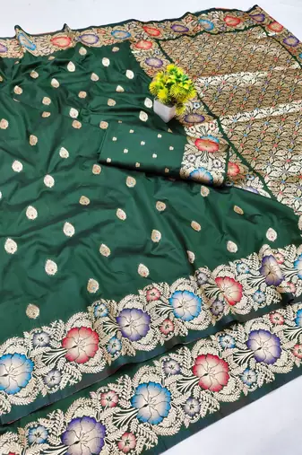 Dark green zari woven banarasi silk blend saree with blouse piece