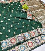 Dark green zari woven banarasi silk blend saree with blouse piece