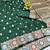 Dark green zari woven banarasi silk blend saree with blouse piece