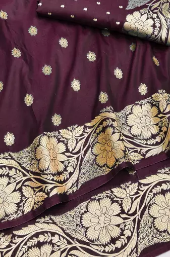 Wine zari woven silk blend saree with blouse piece