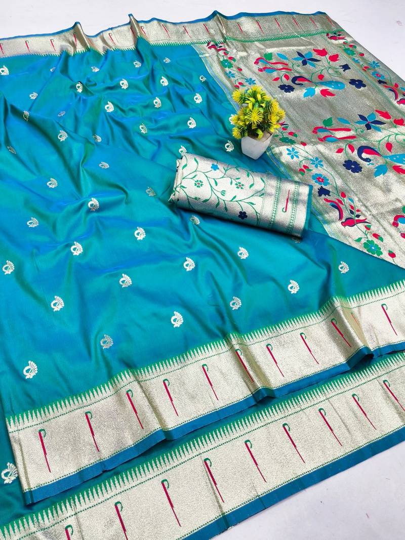Rama zari woven paithani silk blend saree with blouse piece