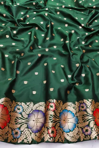 Dark green zari woven silk blend saree with blouse piece