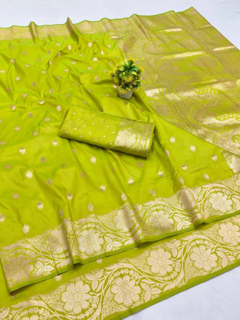 Lime zari woven banarasi silk blend saree with blouse piece