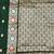 Dark green zari woven banarasi silk blend saree with blouse piece