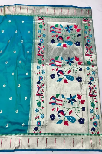 Rama zari woven paithani silk blend saree with blouse piece