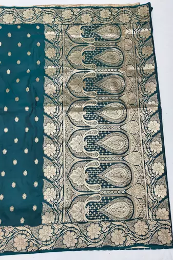 Firozi zari woven silk blend saree with blouse piece