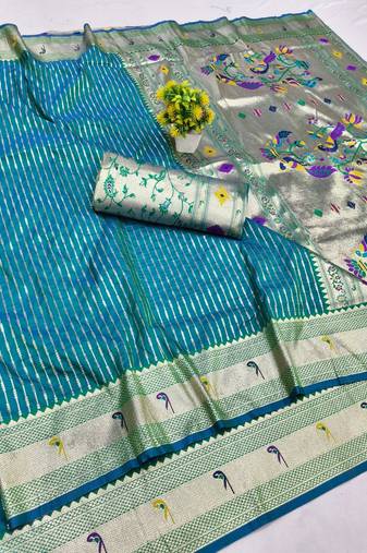 Rama zari woven paithani silk blend saree with blouse piece