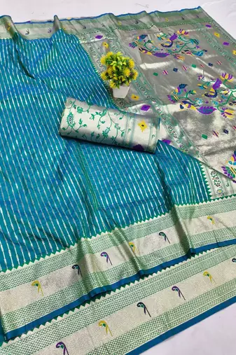 Rama zari woven paithani silk blend saree with blouse piece