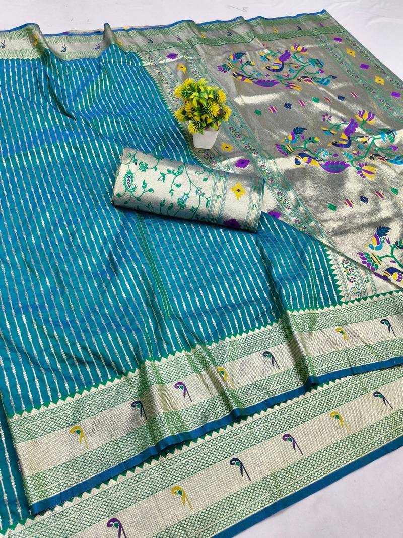 Rama zari woven paithani silk blend saree with blouse piece