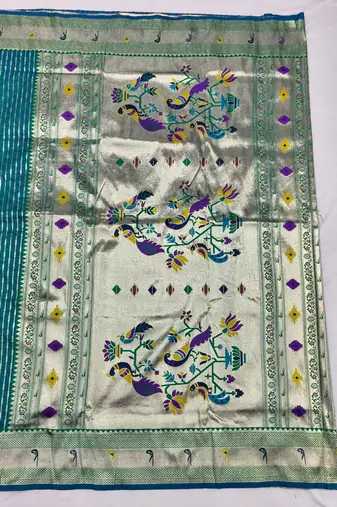 Rama zari woven paithani silk blend saree with blouse piece