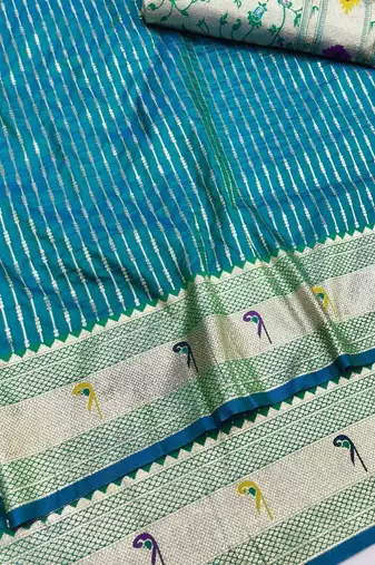 Rama zari woven paithani silk blend saree with blouse piece
