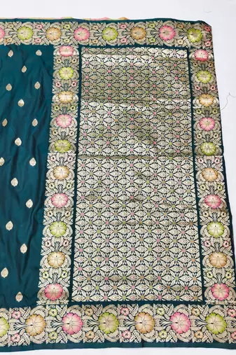 Firozi zari woven silk blend saree with blouse piece