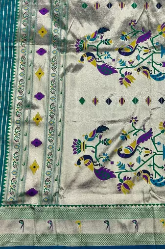 Rama zari woven paithani silk blend saree with blouse piece