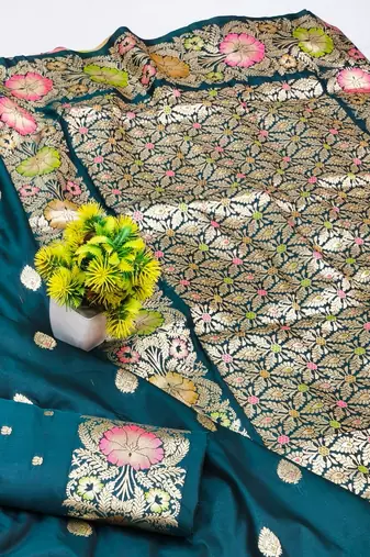 Firozi zari woven silk blend saree with blouse piece