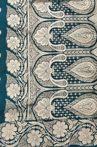 Firozi zari woven silk blend saree with blouse piece