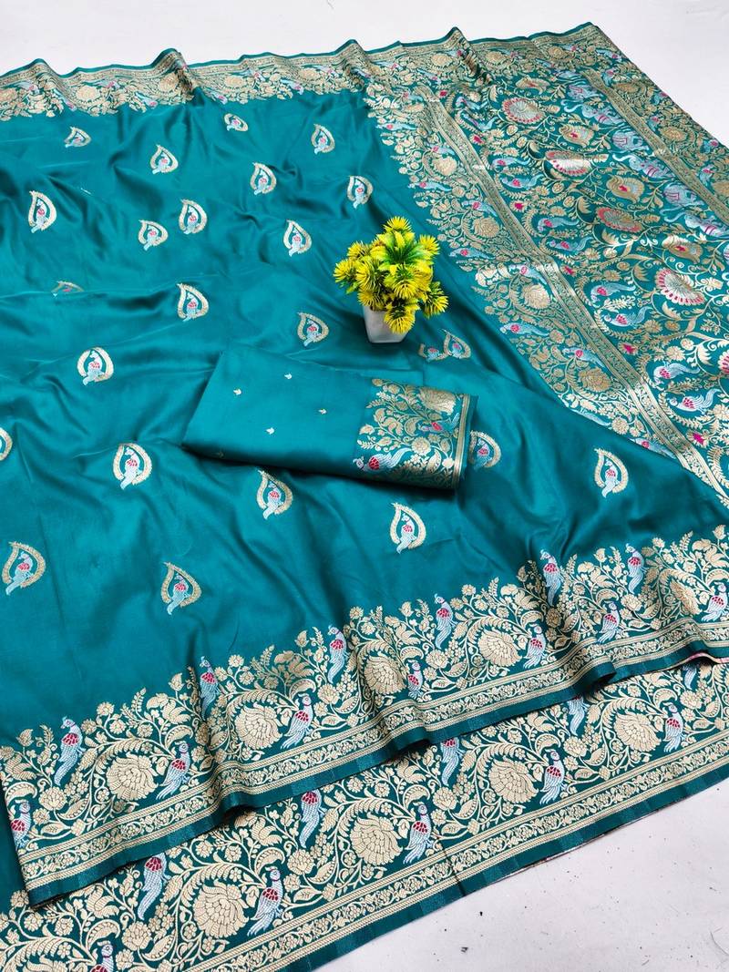 Light blue zari woven banarasi silk blend saree with blouse piece