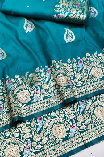 Light blue zari woven silk blend saree with blouse piece