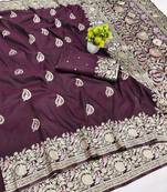 Wine zari woven banarasi silk blend saree with blouse piece
