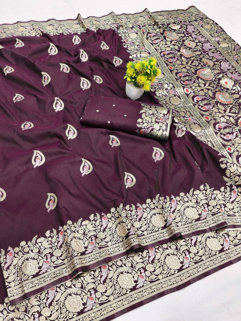 Wine zari woven banarasi silk blend saree with blouse piece