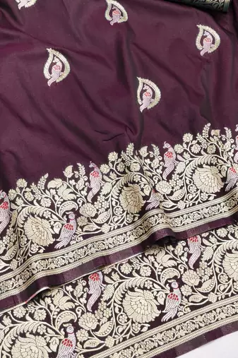 Wine zari woven silk blend saree with blouse piece