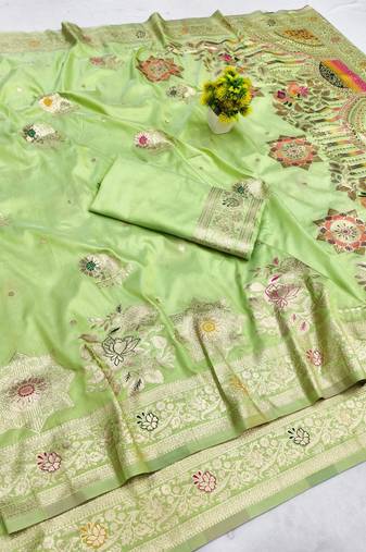 Light green zari woven banarasi silk blend saree with blouse piece
