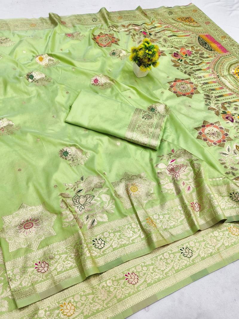 Light green zari woven banarasi silk blend saree with blouse piece