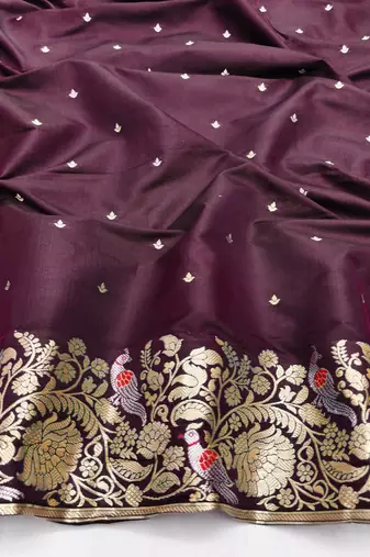 Wine zari woven silk blend saree with blouse piece