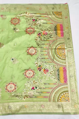 Light green zari woven silk blend saree with blouse piece