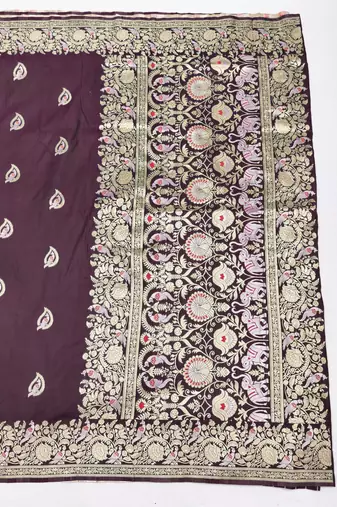 Wine zari woven silk blend saree with blouse piece