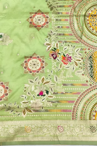 Light green zari woven silk blend saree with blouse piece