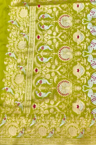 Lime zari woven silk blend saree with blouse piece