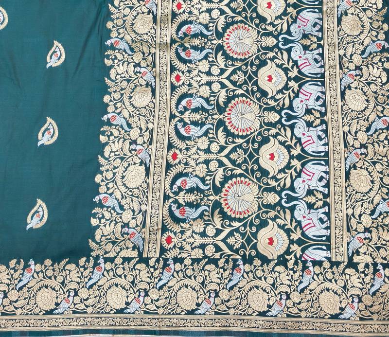Blue zari woven banarasi silk blend saree with blouse piece