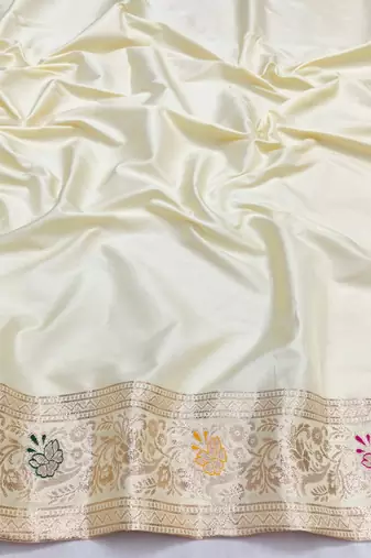Cream zari woven silk blend saree with blouse piece