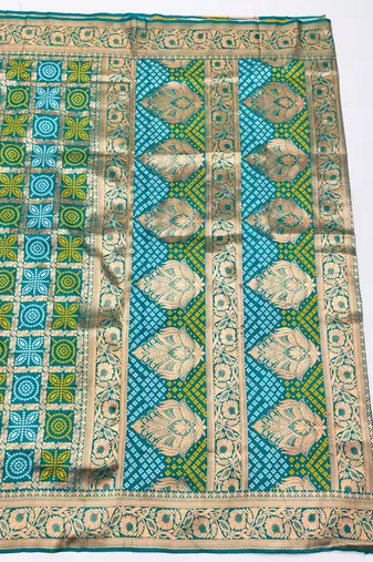 Rama zari woven silk blend saree with blouse piece
