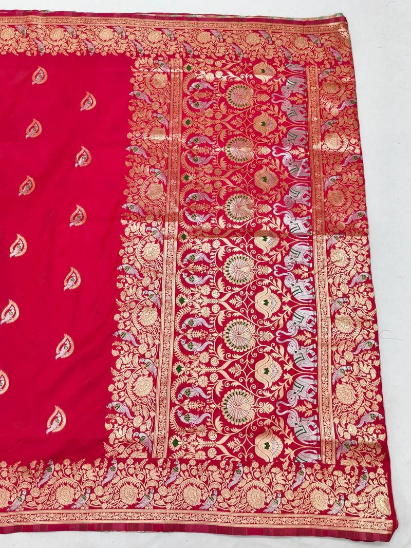 Pink zari woven banarasi silk blend saree with blouse piece