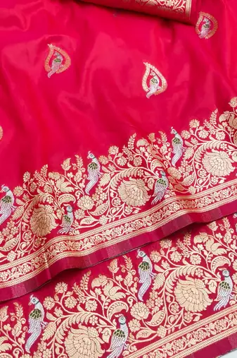 Pink zari woven silk blend saree with blouse piece
