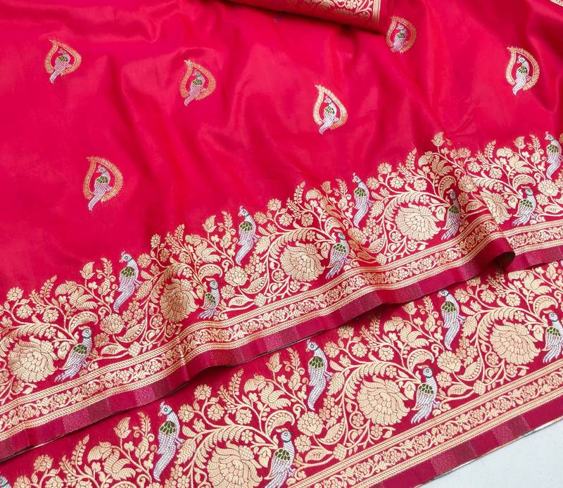 Pink zari woven banarasi silk blend saree with blouse piece
