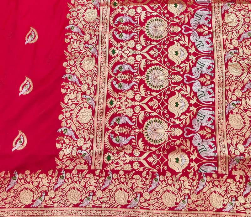 Pink zari woven banarasi silk blend saree with blouse piece