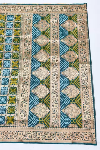 Firozi zari woven silk blend saree with blouse piece