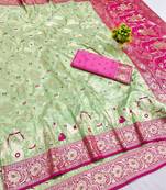 Light green zari woven banarasi silk blend saree with blouse piece